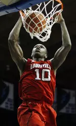 Louisville's Gorgui Dieng scores against DePaul during the first half. (AP Images)