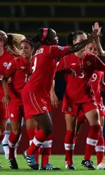 Christine Exeter celebrates with teammates at the U-20 World Cup. (Getty Images)