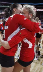 Katie George and Lola Arslanbekova celebrate the upset.