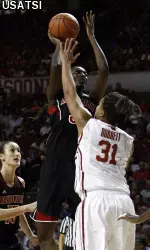 Asia Taylor goes up to shoot.