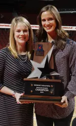 Louisville SWA Christine Herring presents Anne Kordes with the AAC trophy.