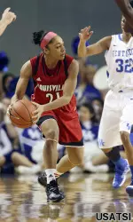 Bria Smith looks to pass the ball.
