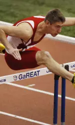 Calvin Arsenault took third in the 60m hurdles finals with a school-record time.