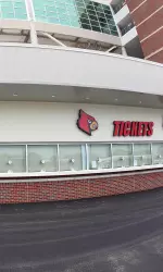 The ticket office is located near the Cardinal Authentic store at Papa John's Cardinal Stadium.