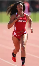 Margret Harris logged a school-record 11.48 in the 100m to advance to Friday's quarterfinal.