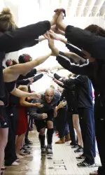 Joao De Lucca takes part in Senior Day Festivities.