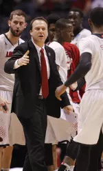 Louisville assistant Mike Balado