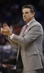 Coach Rick Pitino has added another seven-footer to the Cardinals' recruiting class.