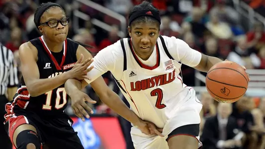 Nov 25, 2014; Louisville, KY, USA; Cardinals forward Myisha Hines-Allen (2) dribbles against Western Kentucky Lady Toppers forward Tashia Brown (10) during the second half. Jamie Rhodes-USA TODAY Sports