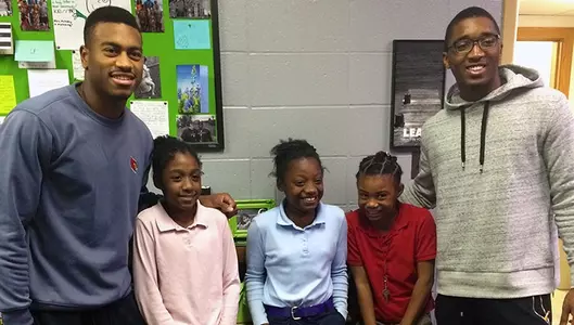Trey Lewis and Donovan Mitchell at school service