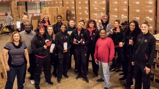 Louisville women's basketball volunteered at Dare to Care on Nov. 23.