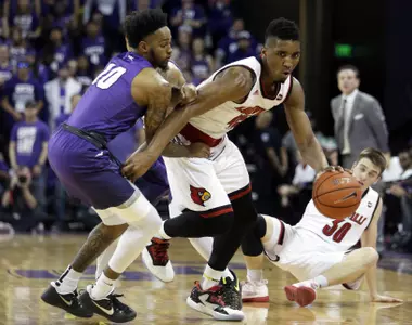Louisville guard Donovan Mitchell steals the ball from Grand Canyon guard Shaq Carr (10) during the first half of an NCAA college basketball game, Saturday, Dec. 3, 2016, in Phoenix. (AP Photo/Rick Scuteri)