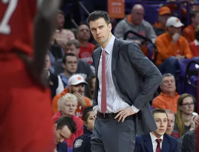 Louisville's interim head coach David Padgett watches the action during the first half of an NCAA college basketball game against Clemson, Saturday, Jan. 6, 2018, in Clemson, S.C. (AP Photo/Richard Shiro)
