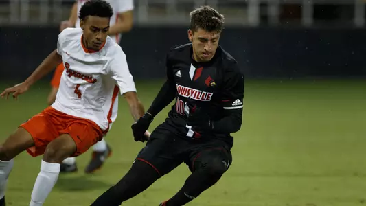 Tate Schmitt pushes the ball up field against Syracuse at Lynn Stadium, October 12, 2018.