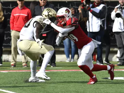 Wake Forest's Steven Claude (88) attempts to tackle Louisville running back Hassan Hall (19) during the first half of an NCAA college football game, Saturday, Oct. 27, 2018, in Louisville, Ky. (AP Photo/Timothy D. Easley)