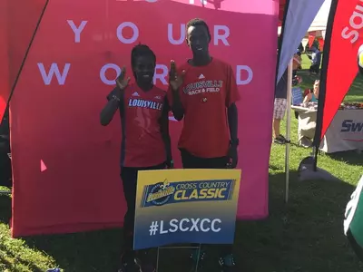 Louisville's Dorcas Wasike and Emmanuel Cheboson celebrate their victories at the Louisville Cross Country Classic.
