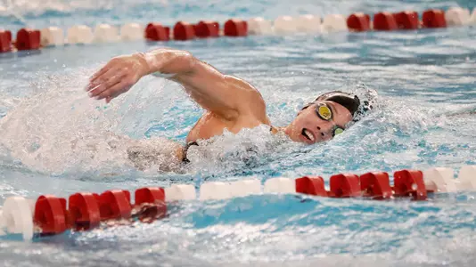 Mallory Comerford races the 200 freestyle at the Ralph Wright Natatorium.