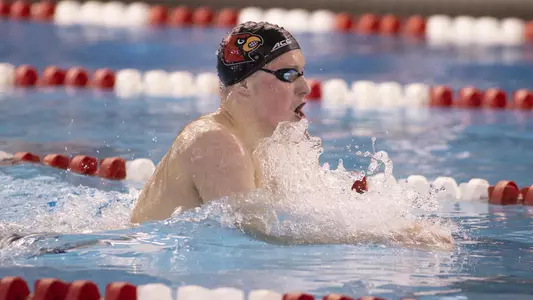 Louisville Cardinal swimmers compete against Virginia at Ralph Wright Natatorium on November 3.