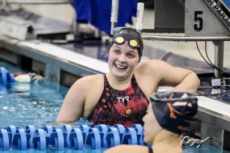 Grace Oglesby checks her time at the touch pad.