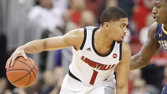 Christen Cunningham eyes a Kent State defender in a Dec. 15 game at the KFC Yum! Center.