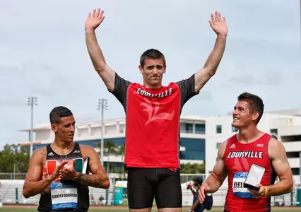 University of Miami's Andreas Christodoulou (L) Louisville's Eric Fox (C) and teammate Joe Delgado (R) celebrate following the Men's Decathlon during the 2018 ACC Outdoor Track and Field Championship in Coral Gables, Fl., Friday May 11, 2018. (Photo by Rhona Wise, theACC.com