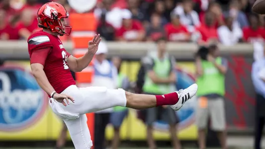 This is Mason King punting the football.