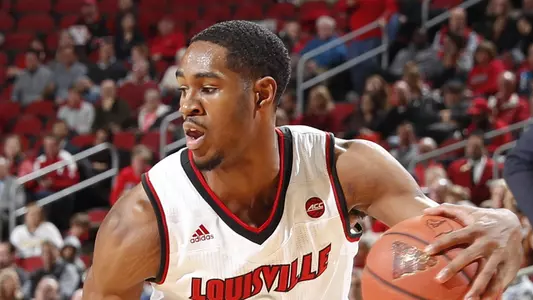 V.J. King looks to drive during a game in the 2017-18 season in the KFC Yum! Center.