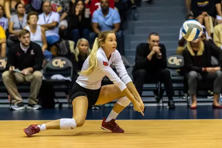 Molly Sauer digs the ball during the Cards game against GT in Atlanta