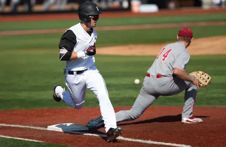 Drew Campbell safely runs to first base during the Louisville vs. Indiana game at Jim Patterson Stadium, September 29, 2018.