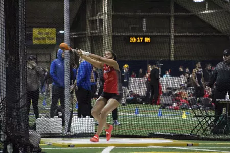 Makenli Forrest throws the weight throw at the Gene Edmonds Cup