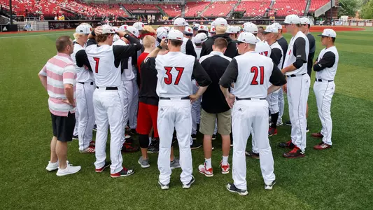 Louisville players huddle prior to their game with Notre Dame at Patterson Stadium on May 19, 2018.