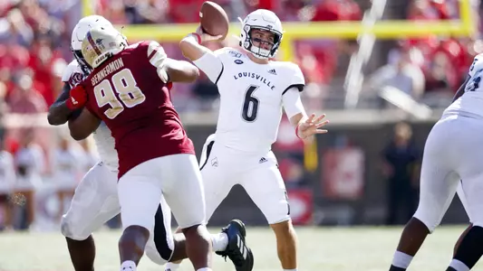Evan Conley throws a pass versus BX