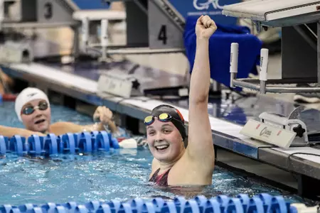 Grace Oglesby celebrates the end of the 200 fly