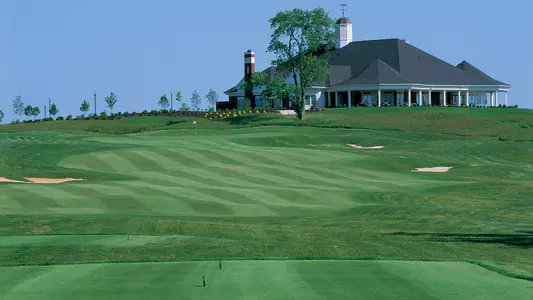 A look up No. 18 toward the impressive clubhouse at the UofL Golf Club.