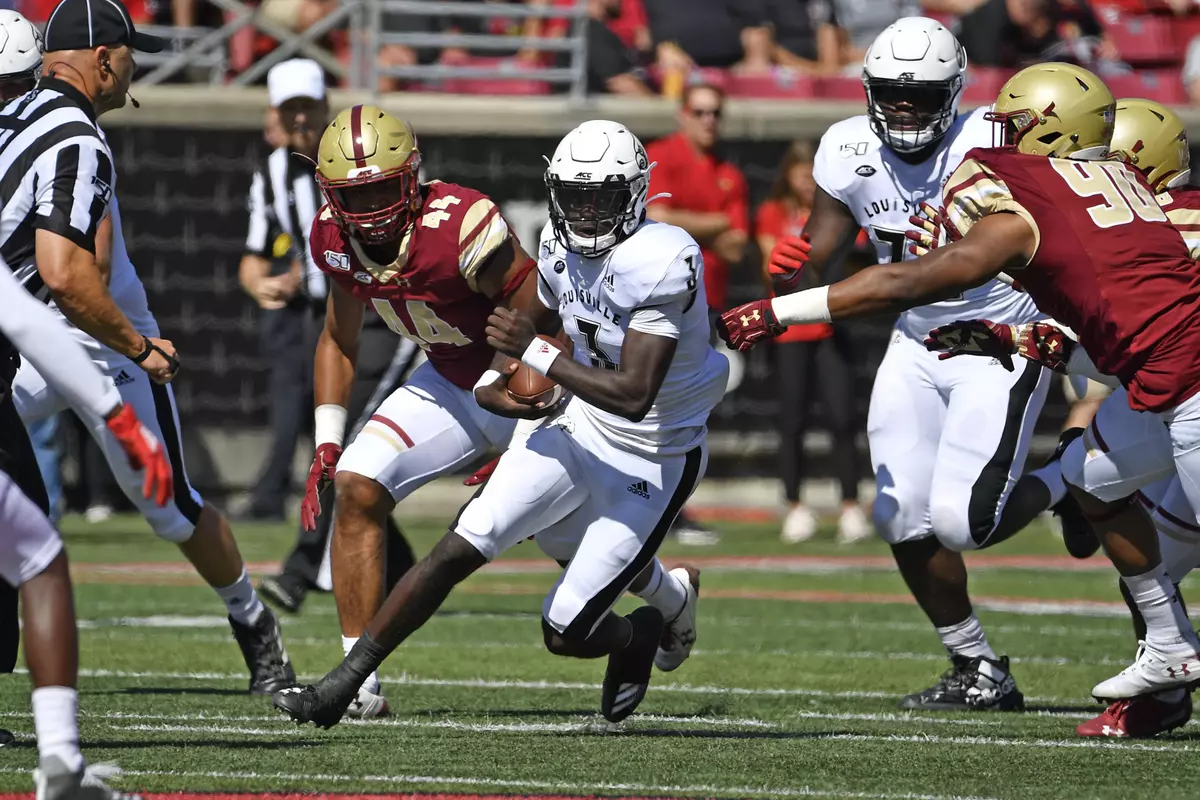 CORRECTS FIRST NAME TO MICALE, NOT MALIK - Louisville quarterback Micale Cunningham (3) runs through an opening in the Boston College defense during the first half of an NCAA college football game in Louisville, Ky., Saturday, Oct. 5, 2019. (AP Photo/Timothy D. Easley)