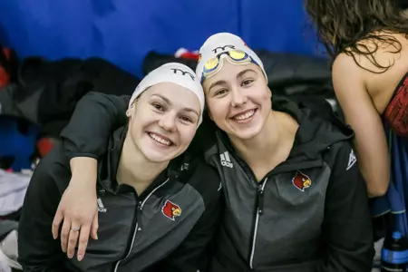 Mariia Astashkina and Arina Openysheva pose on deck for a selfie