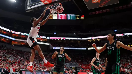 David Johnson dunks for his first career basket against USC Upstate.
