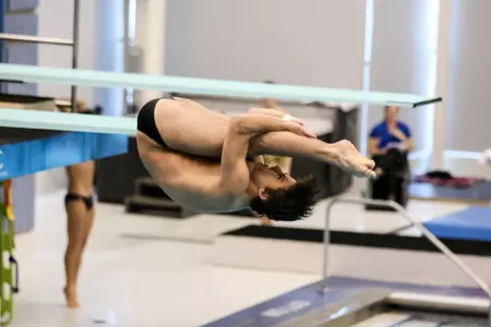 Kivanc Gur dives in the pike position