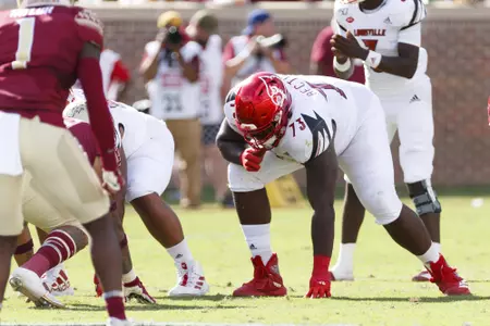 Mekhi Becton lines up versus Florida State.