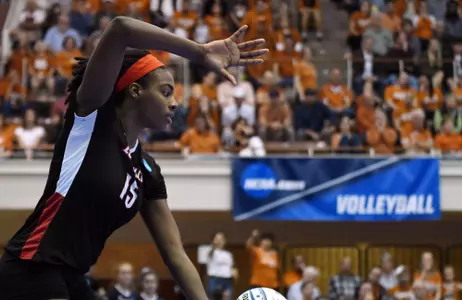 Aiko Jones serves against Texas