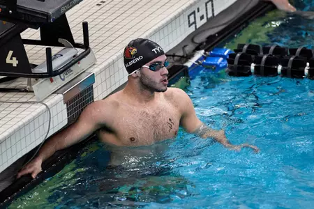 Nick Albiero checks the clock at the Purdue Invitational
