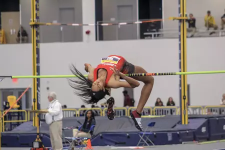 Alivia Ash clears the high bar at the Power Five Invitational