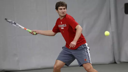 Brandon Lancaster during the Cardinals match with Austin Peay at Bass-Rudd Tennis Center on February 17.