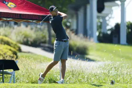Matthias Schmid tees off on the first day of the Cardinal Challenge, hosted by the University of Louisville at the UofL Golf Club in Simpsonville, Ky.