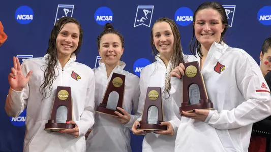 This is a photo of the Louisville women's swimming team.