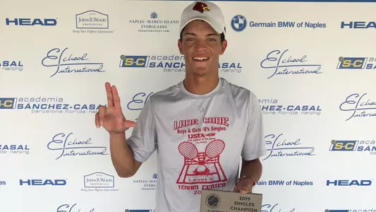 Louisville signee Matthew Fung poses with his championship plaque