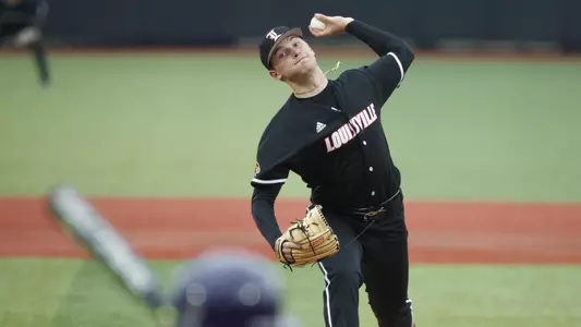 Reid Detmers throws a pitch against James Madison at Jim Patterson Stadium.