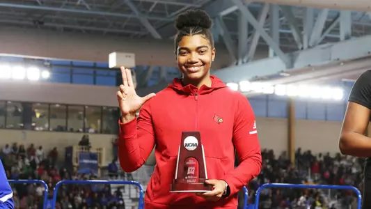 Makenli Forrest on the podium following her second place finish in the weight throw at the NCAA Championships