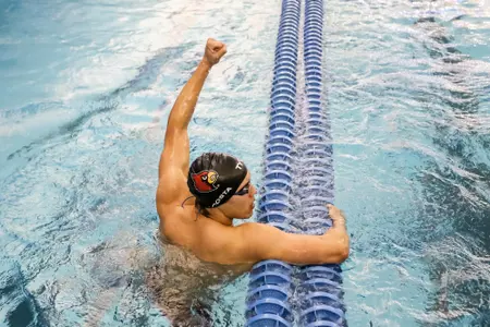 Marcelo Acosta celebrates after a podium finish at the ACC Championships.