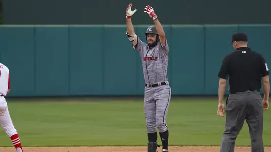 Alex Binelas celebrates after a double at NC State.